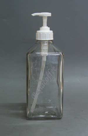 Glass bottle with pump head
